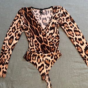 Long sleeve leopard print bodysuit. Windsor - size xsmall - gently used.